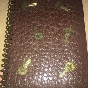 Moschino redwall key studded pocket book